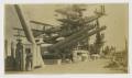 Photograph: [Photograph of Airplanes and Guns on U.S.S. Texas]