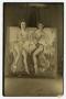 Photograph: [Photograph of Two Girls Standing Behind Painted Scene]