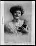 Photograph: Postcard of Lady with Cat