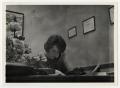 Photograph: [Photograph of McMurry College Secretary on Phone]
