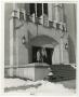 Photograph: [Photograph of Two Students Standing in Front of Radford Hall]