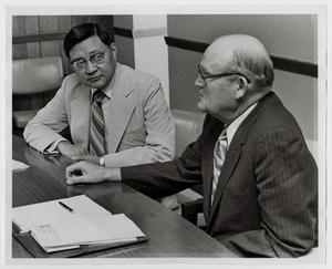 Primary view of object titled '[Photograph of Dr. Thomas Kim at a Meeting]'.
