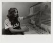 Photograph: [Photograph of Student at Switchboard]