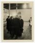 Photograph: [Photograph of Dr. Clustor Q. Smith with Others in a Gym]