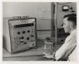 Thumbnail image of item number 1 in: '[Photograph of Student With Electronic Counter]'.