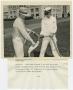 Primary view of [Photograph of Two Men With Hose]