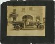 Photograph: [Fire Engine in Front of Fire Station]