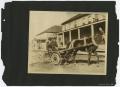 Primary view of [Photograph of Men in Horse-Drawn Wagon]
