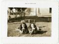 Photograph: [Photograph of Two Girls on Front Lawn]