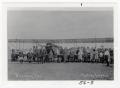 Photograph: [Children in Front of Plane at Beasley Field]