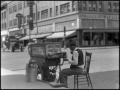 Photograph: [Man with a Food Cart]