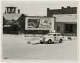 Photograph: [El Paso Police Car Parked by a Mobilgas Billboard]