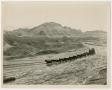 Thumbnail image of item number 1 in: '[Mule Wagon Passing by Mountains]'.