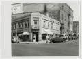 Thumbnail image of item number 1 in: '[Business Buildings on a Street Corner]'.