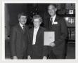 Photograph: [Three People in the Chancel of St. Paul Lutheran Church]