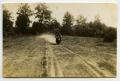 Photograph: [Photograph of Soldier on Motorcycle]