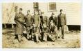 Photograph: [Photograph of Soldiers Outside Barracks]