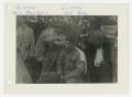 Photograph: [Photograph of Soldier Giving Haircut]