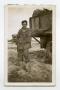 Photograph: [Photograph of William Jenkins with Half-Track]