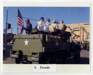 Primary view of object titled '[12th Armored Division Veterans in Parade]'.