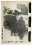 Photograph: [Photograph of Lieutenants and Tank in Snow]