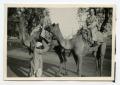 Photograph: [Photograph of Soldiers on Camels]
