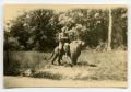Photograph: [Photograph of Soldier on Lion Statue]