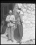 Photograph: [Mayor Mary Kyle Hartson and man standing at Fire Station]