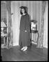Photograph: [Woman Wearing Cap and Gown]