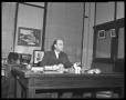 Primary view of [Marvin Hall at Desk]