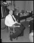 Photograph: [Man Seated in Office]