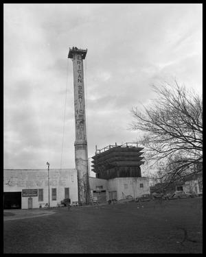 Primary view of object titled '[Demolition of smokestack]'.