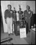 Photograph: Two Men with VFW Softball Tournament Trophies