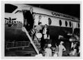 Photograph: [People Exiting a Continental Airplane]