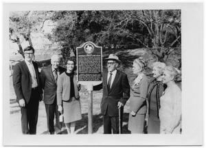 Primary view of object titled '[Otto Lindig Standing at a Historical Marker with Family]'.