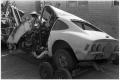 Photograph: [Wrecked Car Being Hauled]