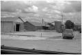 Photograph: [Buildings and Vehicles]