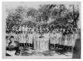 Photograph: [Female Choir Outdoors with a Pianist]