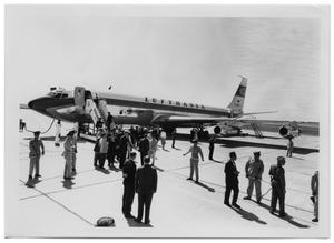 Primary view of object titled '[Ludwig Erhard Stepping Out of an Airplane]'.