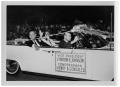 Photograph: [Lyndon Johnson and Henry B. Gonzalez in a Car Passing a Crowd]