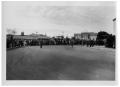 Photograph: [People Standing Around a Cordoned Street]