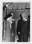 Photograph: [Lady Bird and Lyndon Johnson Stading in Front of a Curtain]