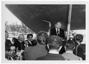Primary view of object titled '[Man Speaking During Adolfo Mateos' Visit to the LBJ Ranch]'.