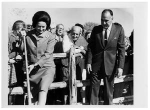 Primary view of object titled '[Lady Bird Johnson Breaking Ground with a Shovel]'.