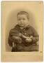 Photograph: [Portrait of a Seated Young Boy]
