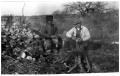 Photograph: [Two Men at a Campfire]