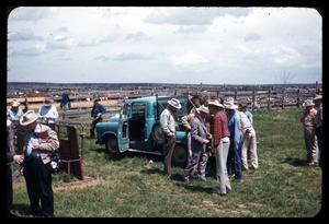 Primary view of object titled '[Truck Near Cattle Pens with People Gathered Around]'.