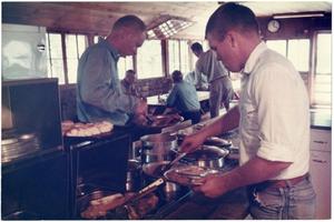 Primary view of [Cowboys Eating Lunch at the Matthews Ranch Cookshack]