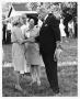 Photograph: [Lyndon B. Johnson Shaking a Woman's Hand]