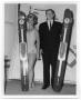 Photograph: Bonnie and Charlie Porter posing with water skis